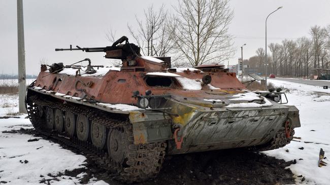 A destroyed Russian military vehicle is seen on the roadside on the outskirts of Kharkiv. Picture: AFP