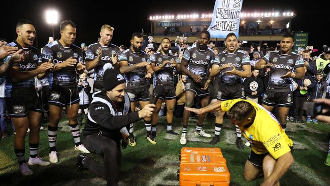 Cronulla sing the team song after a victory. Picture: Brett Costello