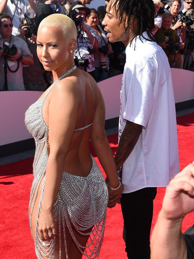 Amber Rose and rapper Wiz Khalifa attend the 2014 MTV Video Music Awards.