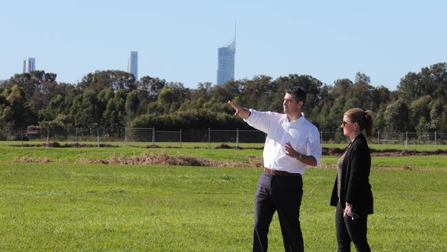 Council has allocated $8 million for the construction of the Robina City Parklands in Division 11. Cr Hermann Vorster shows residents around the site. Cr Hermann Vorster and Natasha Thomson. Picture Glenn Hampson