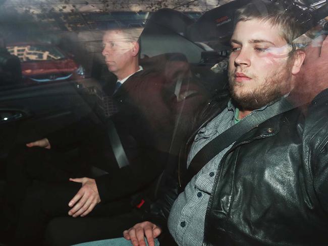 Jaymes Todd (right) being escorted by police into the Melbourne Magistrate Court after his arrest in June 2018. Picture: AAP Image/David Crosling