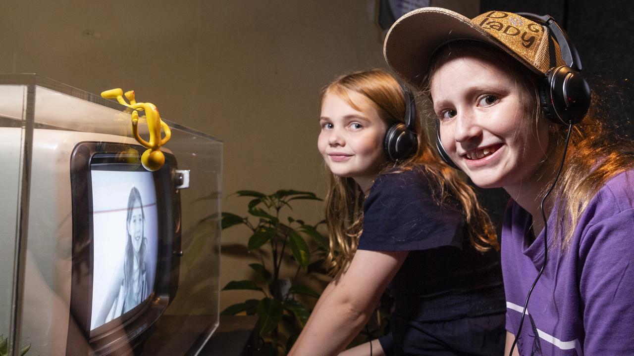 Mia Tolcher (left) and Sarah Trenaman check out a display in the Garden of Curiosity at the Curious Arts Festival at Empire Theatres, Saturday, April 2, 2022. Picture: Kevin Farmer