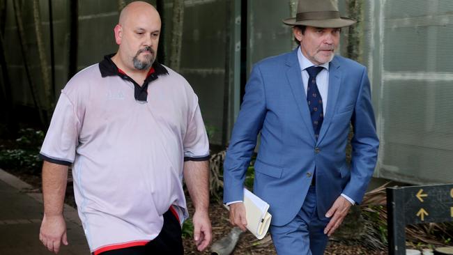 Goodstart Early Learning Edmonton centre director Michael Glenn Lewis (right) leaves the Cairns watch house with his solicitor Derek Perkins. PICTURE: STEWART McLEAN