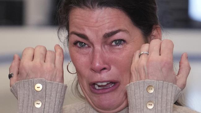 Former Olympic skater Nancy Kerrigan tries to hold back her emotions while addressing the media at The Skating Club of Boston, where six members of the club's community, including athletes, coaches and family, were killed in an airplane collision with a helicopter on Wednesday in Washington, Thursday, Jan. 30, 2025, in Norwood, Mass.  (AP Photo/Charles Krupa)