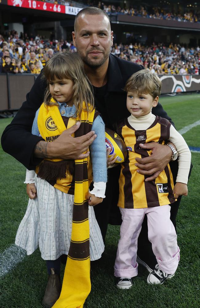 MELBOURNE, AUSTRALIA. April 27, 2024. AFL … Hawthorn vs. Sydney at the MCG. Lance Franklin with his kids, daughter Tullulah and son Rocky on the MCG at halftime. Pic: Michael Klein