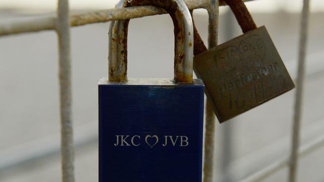 A Glenelg councillor wants the Glenelg jetty to be the new location for "love locks" and for people to propose. So far there are two locks on the jetty. picture: Bianca De Marchi