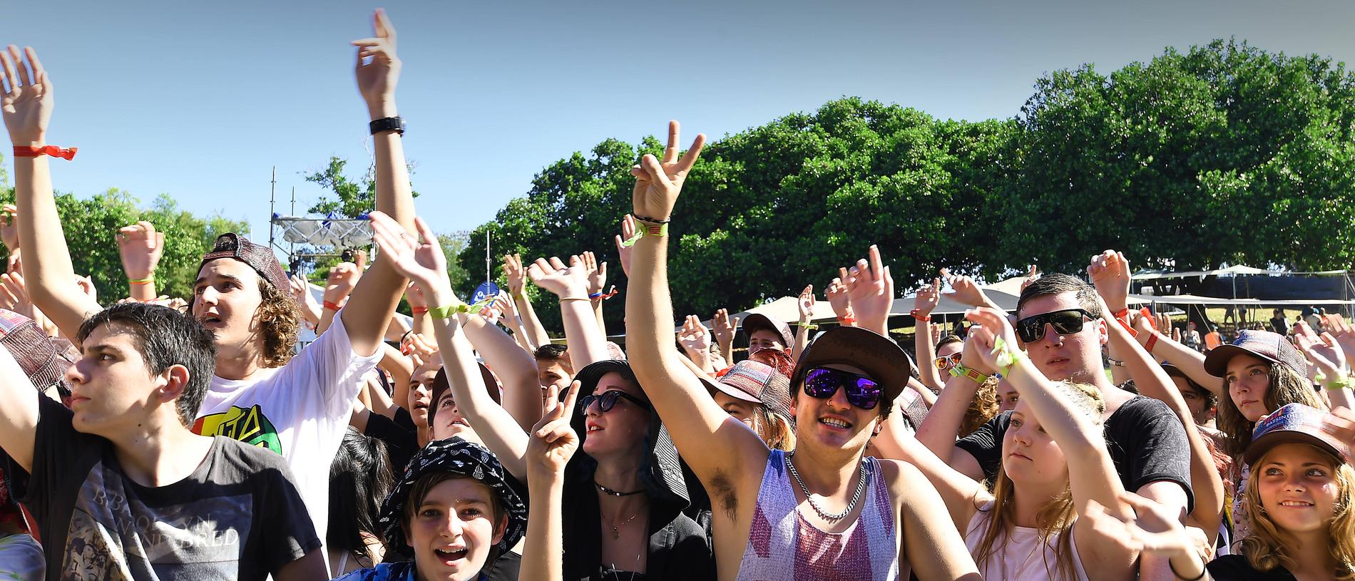 One of the younger crowd goers, Victor Barnes, 11, from Humpty Doo rocks with the big kids at BASSINTHEGRASS 2015