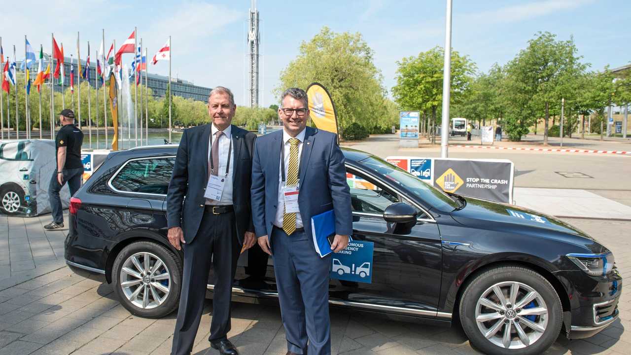SAFETY FIRST: Lauchlan Mcintosh, the chairman of safety organisation Global NCAP, with Member for Hinkler Keith Pitt at the transport forum in Leipzig, Germany. Picture: Simone M. Neumann