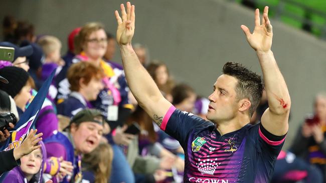 Cooper Cronk of the Storm thanks supporters in the crowd.