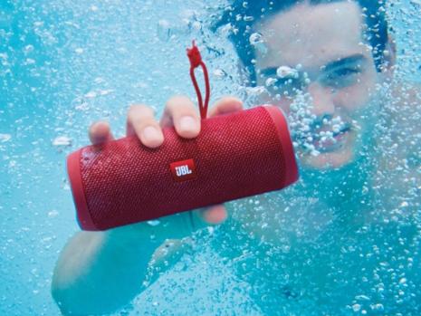 The JBL Flip 4 is a wireless speaker with a water-resistant exterior.