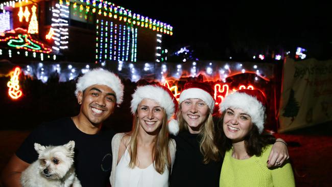 Jan Cabilao, Bronte Gavathas, Olivia Malicki, and Bridget Maloney, at the Borgnis Street Christmas Lights display. Picture: Braden Fastier