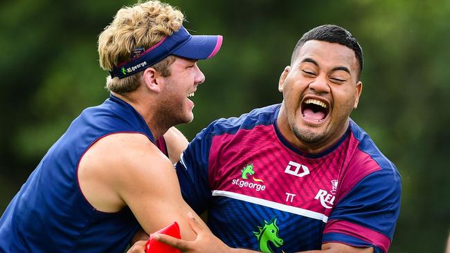 Taniela Tupou (right) has been dominant at the scrum for the Reds. Picture: Stu Walmsley