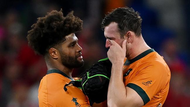 Rob Valetini consoles Nick Frost after the Wallabies crashed out of the World Cup. (Photo by Hannah Peters/Getty Images)