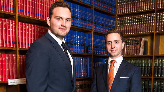 Queensland University of Technology students Alex Wood, left, and Calum Thwaites after the ruling last night. Picture: Joseph Byford