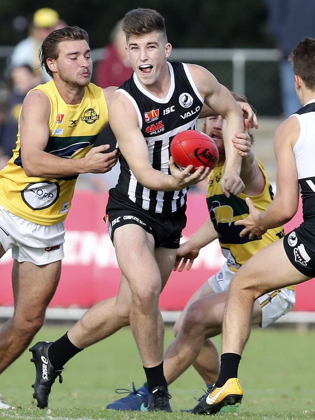 Joe Atley in action for the Port Adelaide Magpies in the SANFL last year.