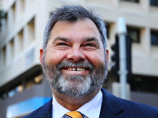 CMNEWS_Newly appointed Queensland Chief Justice Tim Carmody pictured here departing the Supreme court after his swearing in today Tuesday July 8th, 2014. Pictures: Jack Tran / The Courier Mail