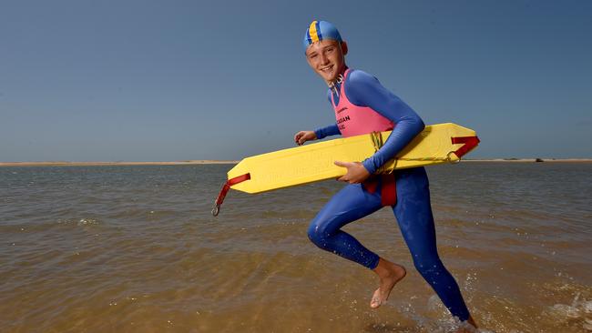 Ned Smith, 13, from the Acardian Surf Lifesaving Club practices his skills at Alva Beach in preparation for his Surf Life Saving Certificate. Picture: Evan Morgan