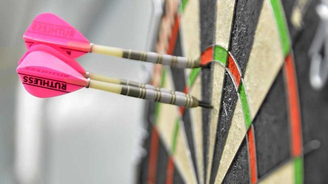 ON TARGET: Biggenden Darts Club members meet at the Commercial Hotel of a Thursday night. Picture: Christopher Chan