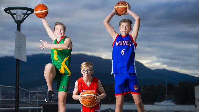 What should the new Tasmanian basketball team be called? Young basketball stars Zoe, 16, Mitchell, 8 and Reiley, 14, Banks. Picture: RICHARD JUPE