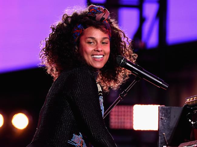 Rocking the natural look on stage. Picture: Gary Gershoff/Getty