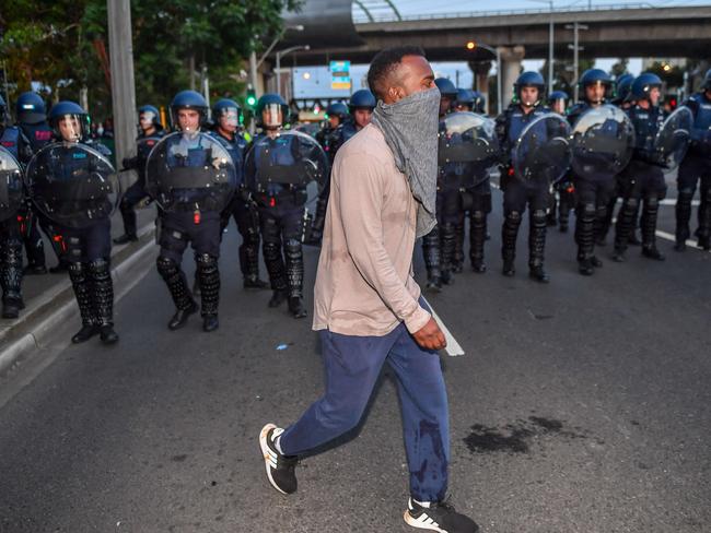 Riot police disperse protesters. Picture: Jake Nowakowski