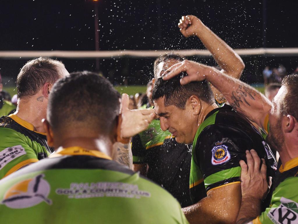 Palmerston Raiders classic gatorade dump on coach Merg Mikaelian as they celebrate winning the NRLNT Grand Final 2022. Picture: (A)manda Parkinson