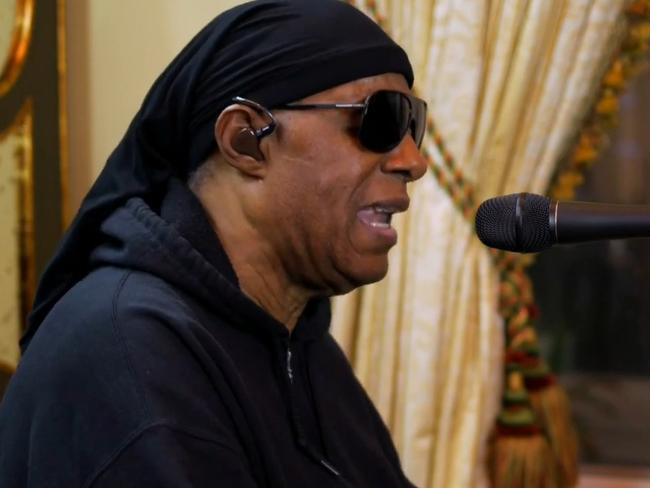 Stevie Wonder performs Lean on Me in tribute to Bill Withers.