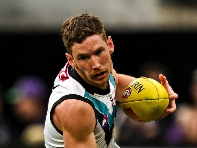 PERTH, AUSTRALIA – AUGUST 25: Kane Farrell of the Power runs with the ball during the 2024 AFL Round 24 match between the Fremantle Dockers and the Port Adelaide Power at Optus Stadium on August 25, 2024 in Perth, Australia. (Photo by Daniel Carson/AFL Photos via Getty Images)