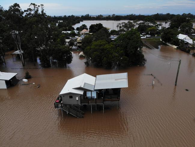 DAILY TELEGRAPH - 6 MARCH, 2022. The clean up continues in Lismore after record rains and flood hit the northern NSW town on Sunday and Monday with the Wilsons River recording a height of 14.3m with the Lismore CBD and surrounding area the hardest hit. The small township of Coraki, south of Lismore has just opened up to some roads again after being cut off by flood waters for most of the week with some homes near Queen Elizabeth Drive still under water. Picture: Toby Zerna