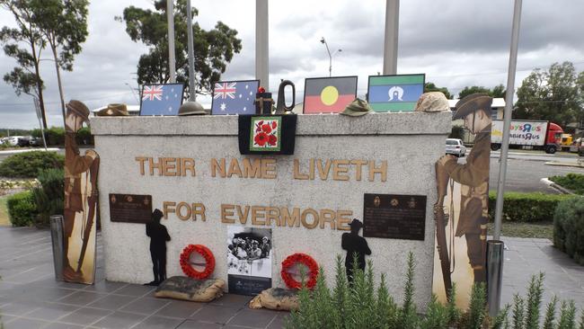 The Logan Central Memorial which Mic Noble decorated and photographed for war veterans who will not be able to gather for the annual ANZAC DAY service this year because of the coronavirus.