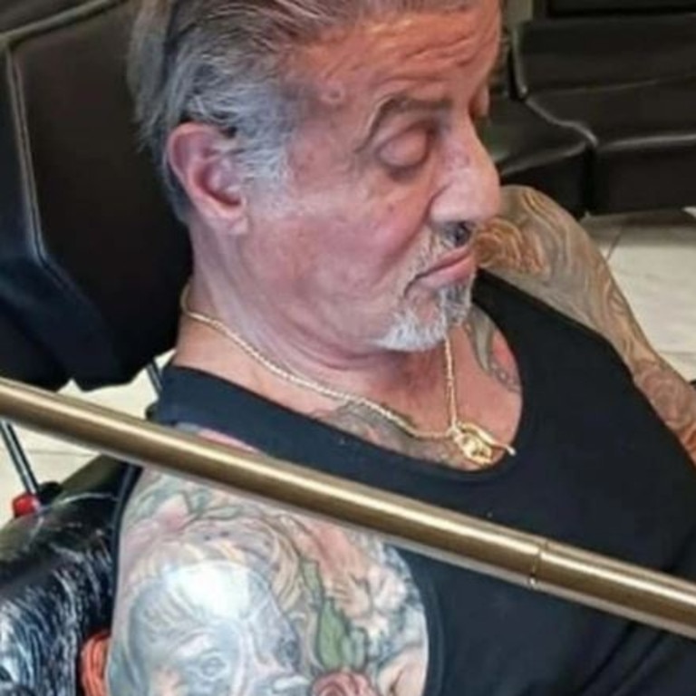 Sylvester Stallone and his updated tattoo.