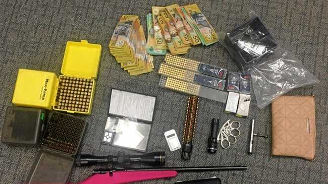 Police seize weapons, cash and drugs in raids at Miles. Picture: QPS