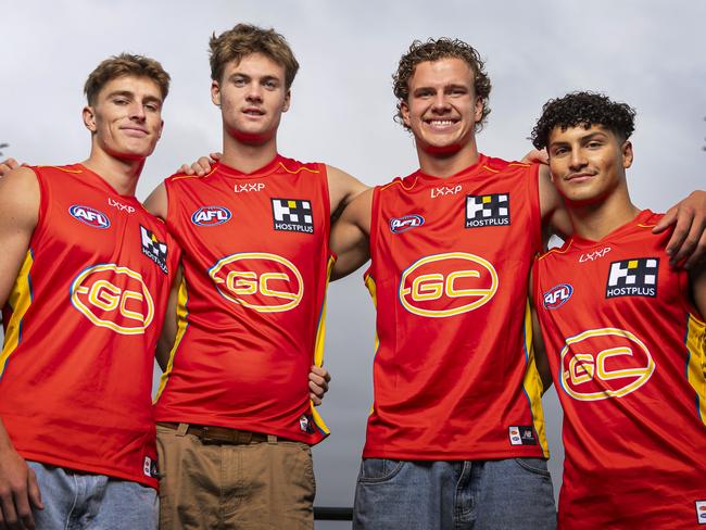 MELBOURNE, AUSTRALIA - NOVEMBER 21: (L-R) Will Graham, Ethan Read, Jed Walter and Jake Rogers of the Suns pose for a photograph following the 2023 AFL Draft at Marvel Stadium on November 21, 2023 in Melbourne, Australia. (Photo by Daniel Pockett/Getty Images)