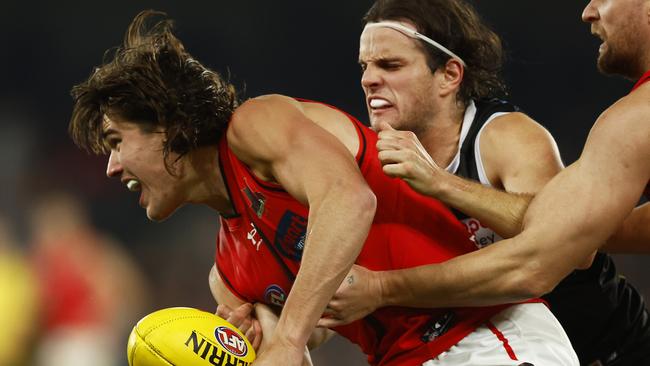 Hunter Clark attempts to lay one of just 38 St Kilda tackles on what was a dirty night for the Saints. Picture: Getty Images