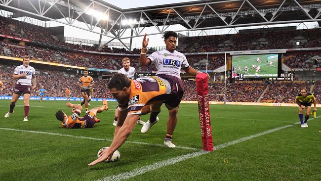 Corey Oates crosses for one of four tries.