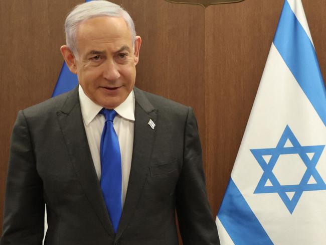 Israeli Prime Minister Benjamin Netanyahu (L) takes a seat before his meeting with France's Foreign Minister Stephane Sejourne (R) in Jerusalem on February 5, 2024. France's top diplomat's first Middle East trip as foreign minister aims at pushing for a ceasefire in Gaza and the release of hostages held by the Palestinian Hamas movement since October 7, a ministry spokesman said. (Photo by GIL COHEN-MAGEN / POOL / AFP)