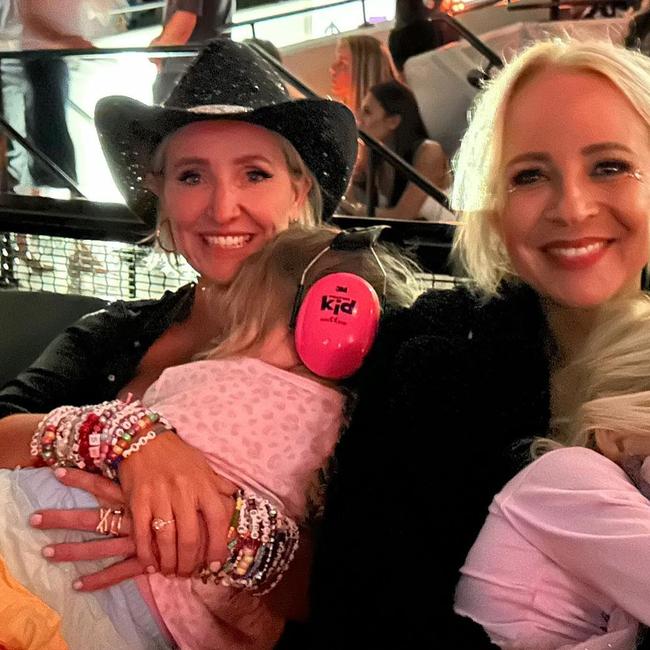 Fifi Box and Carrie Bickmore went to a Melbourne show with their young daughters.