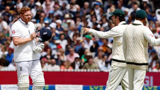 Travis Head makes a point to England’s Jonny Bairstow. Picture: Ian Kington / AFP