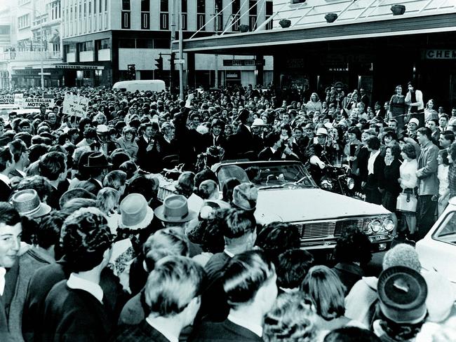 Crowds line the streets of Adelaide for British pop band The Beatles’ arrival in June, 1964.