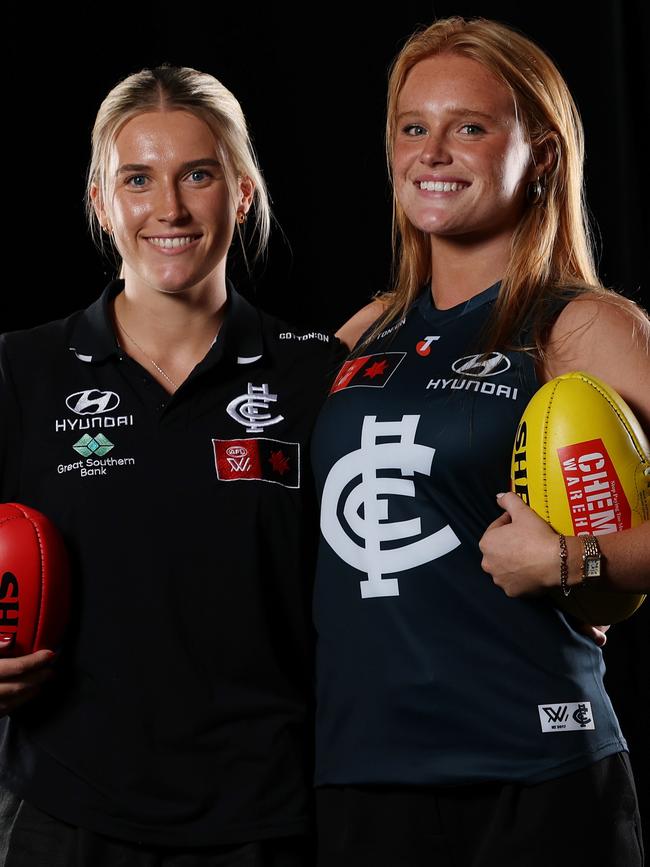 Abbie McKay will captain her younger sister, Sophie (right), who was taken as a father-daughter selection with pick 17 in last year’s draft. Picture: Morgan Hancock / Getty Images