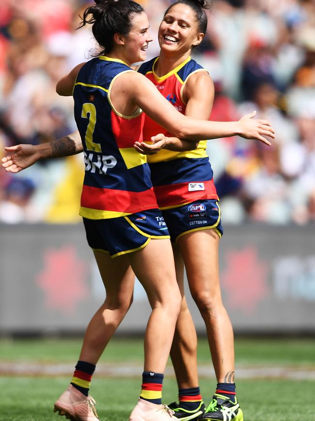 Crows players Eloise Jones celebrates a goal with Stevie-Lee Thompson during their side’s AFLW preliminary final match against Geelong at Adelaide Oval on March 24, 2019. Picture: MARK BRAKE/GETTY IMAGES