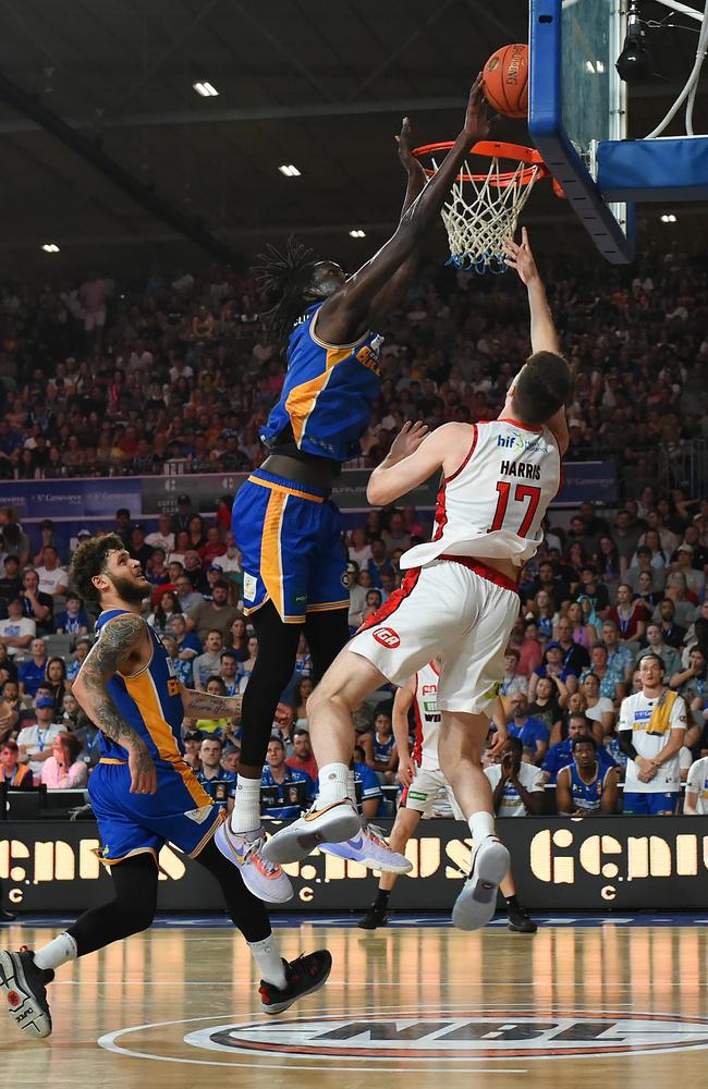 Spring-heeled Gorjok Gak as a huge defensive presence. Picture: Getty Images