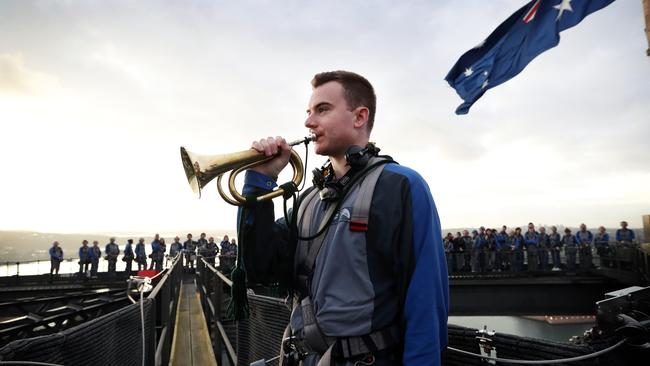 Australian Army Bugler Benjamin Bruni performs The Last Post. Picture: Richard Dobson