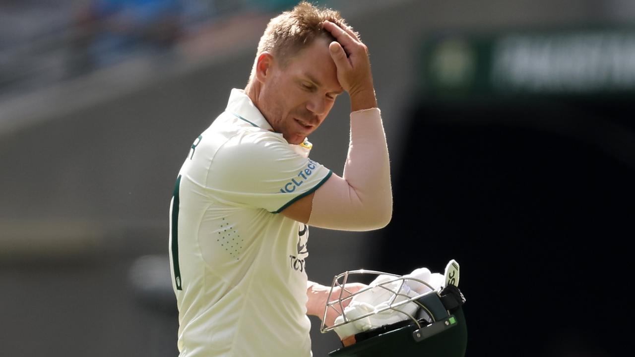 David Warner of Australia looks dejected after being dismissed by Khurram Shahzad of Pakistan. Photo by Paul Kane/Getty Images.