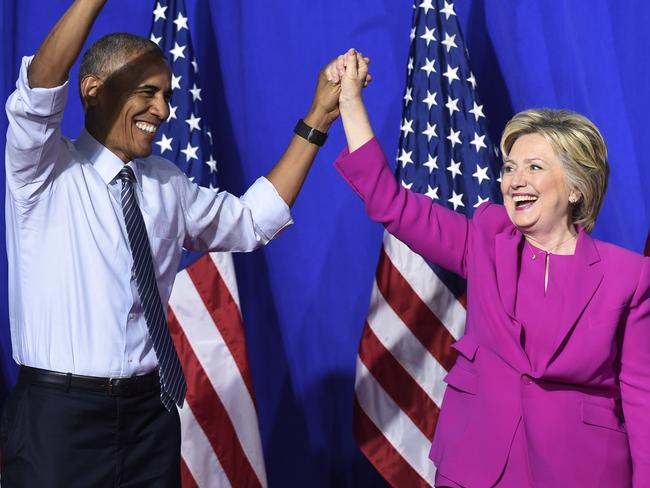 President Barack Obama and Democratic presidential candidate Hillary Clinton arrive at a campaign event at the Charlotte Convention Centre in Charlotte, North Carolina.  Picture:  AP