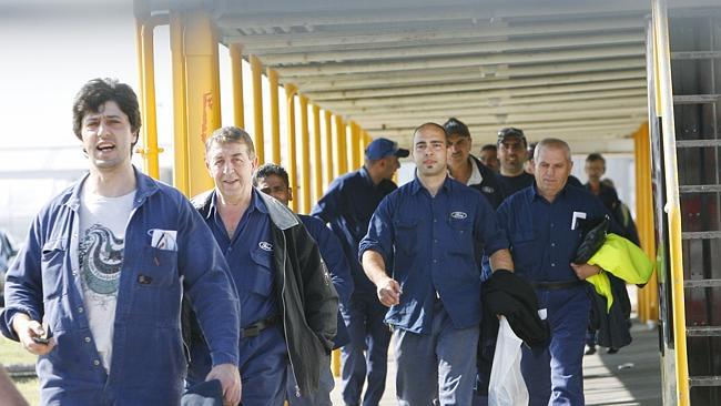  Workers leave Ford factory's Broadmeadows plant in Melbourne after they first found out further staff cutbacks were in store last year. 