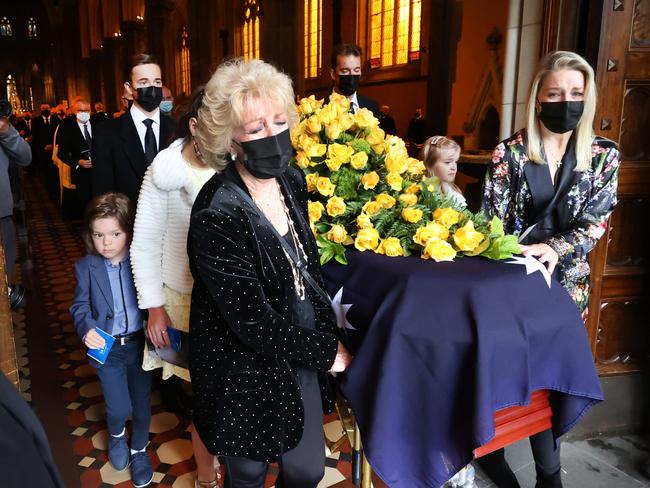 Patti and Lauren lead mourners out of St Patrick’s. Picture: David Caird