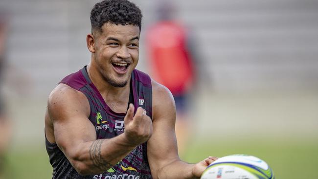 New Queensland Reds centre Hunter Paisami at training in Brisbane