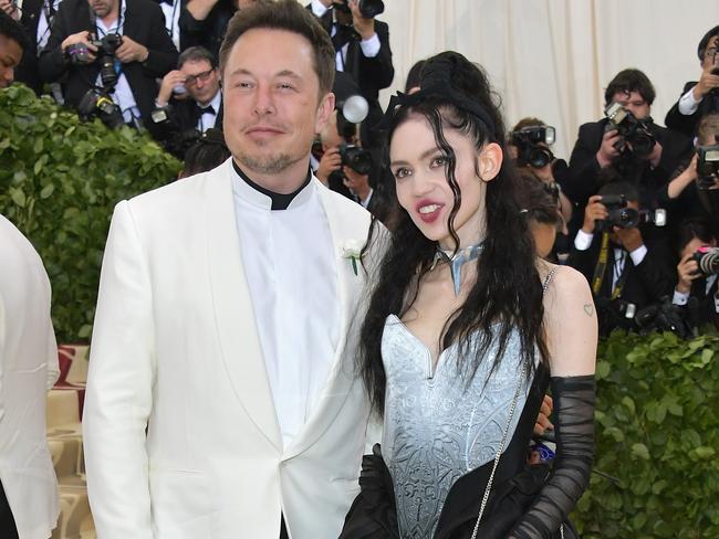 NEW YORK, NY - MAY 07:  Elon Musk and Grimes attend the Heavenly Bodies: Fashion & The Catholic Imagination Costume Institute Gala at The Metropolitan Museum of Art on May 7, 2018 in New York City.  (Photo by Neilson Barnard/Getty Images)