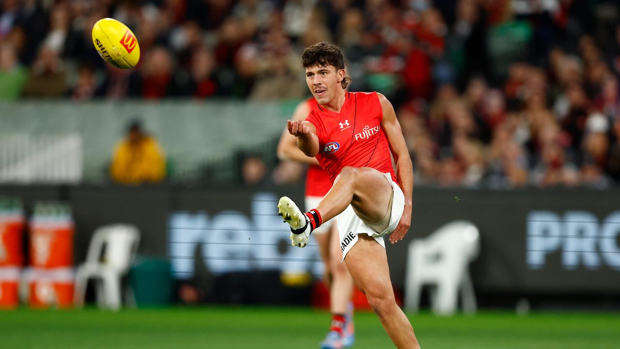 MELBOURNE, AUSTRALIA - APRIL 01: Massimo D'Ambrosio of the Bombers kicks the ball during the 2023 AFL Round 03 match between the St Kilda Saints and the Essendon Bombers at the Melbourne Cricket Ground on April 1, 2023 in Melbourne, Australia. (Photo by Michael Willson/AFL Photos via Getty Images)